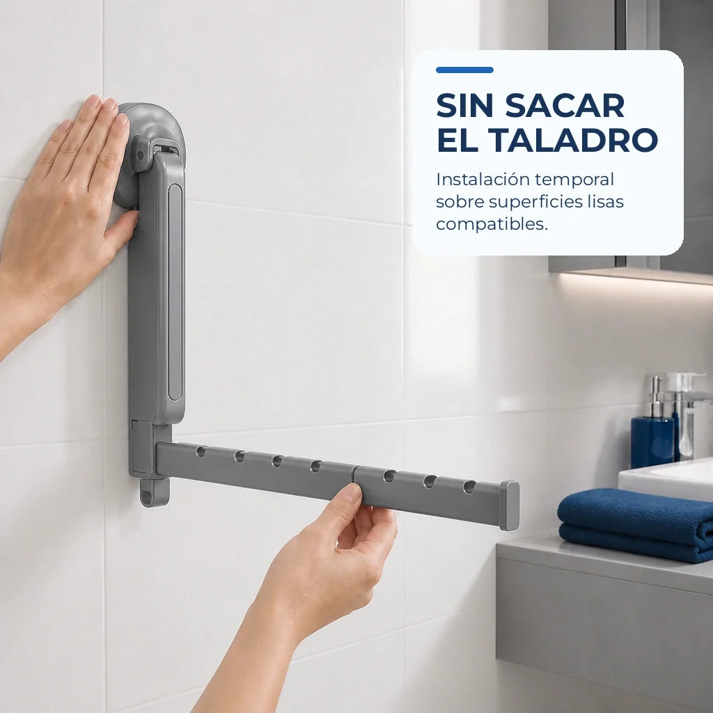 Instalación temporal del tendedero plegable gris sobre una superficie lisa sin perforar