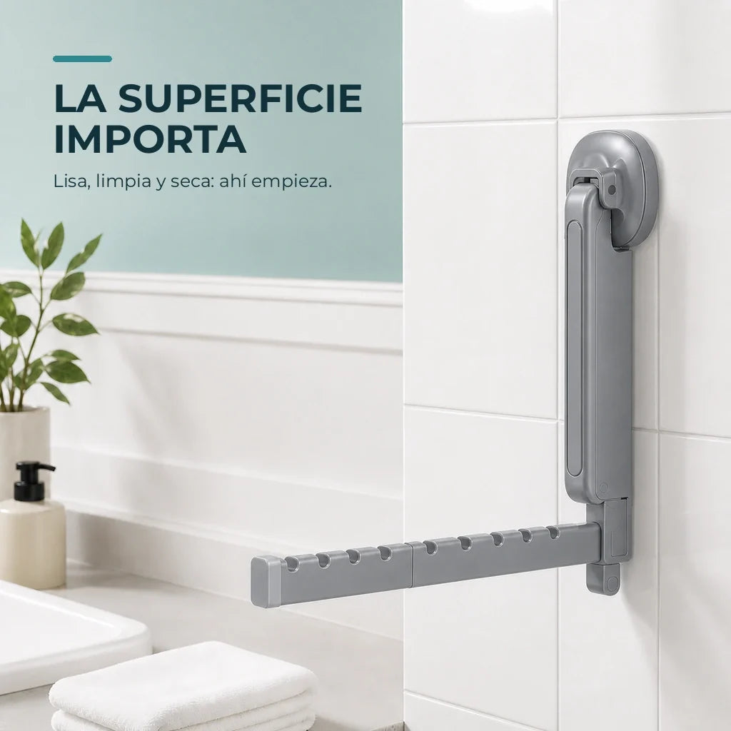 Detalle de la ventosa del tendedero gris sobre una superficie lisa, limpia y seca