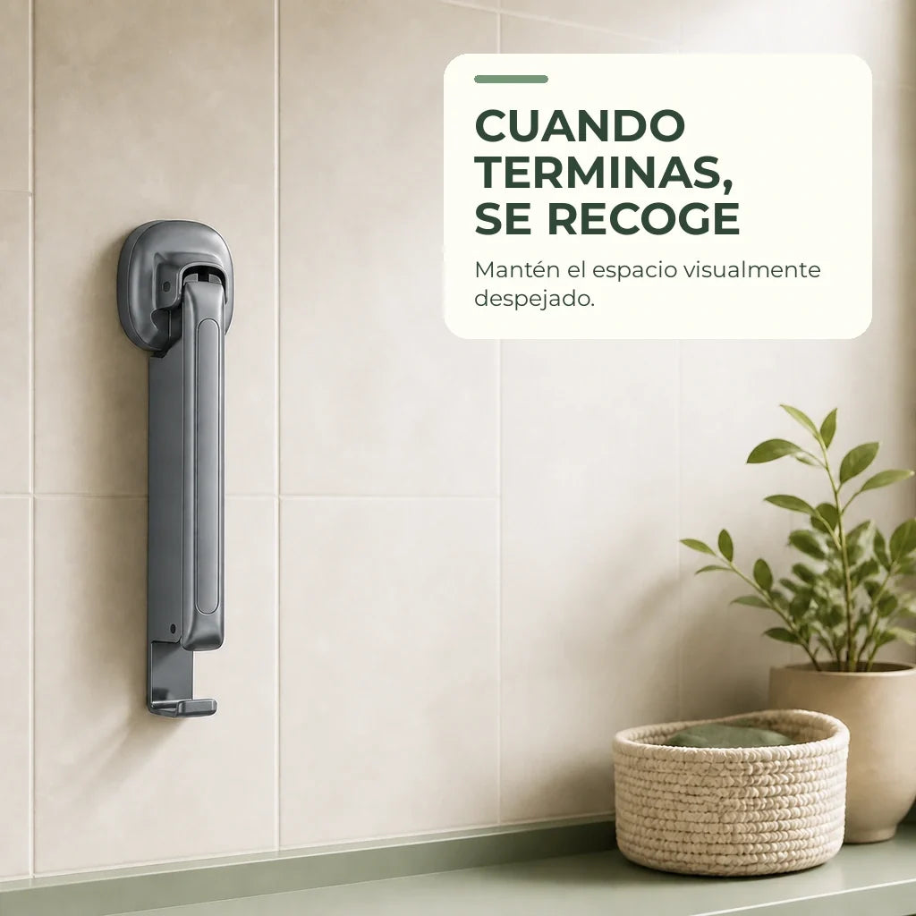 Tendedero gris plegado para mantener el espacio visualmente despejado